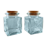 Pair of square jars in tinted glass and corks