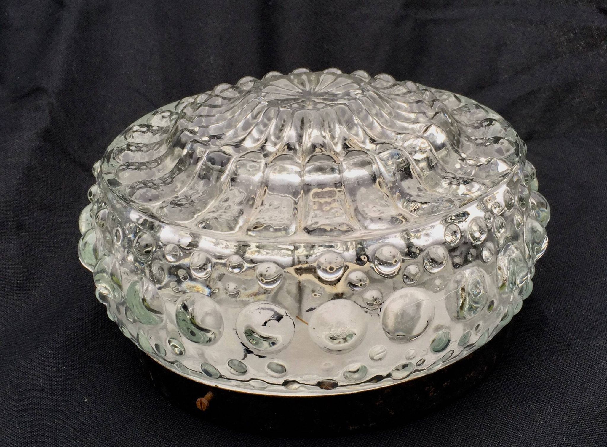 Round ceiling light or wall light in molded glass