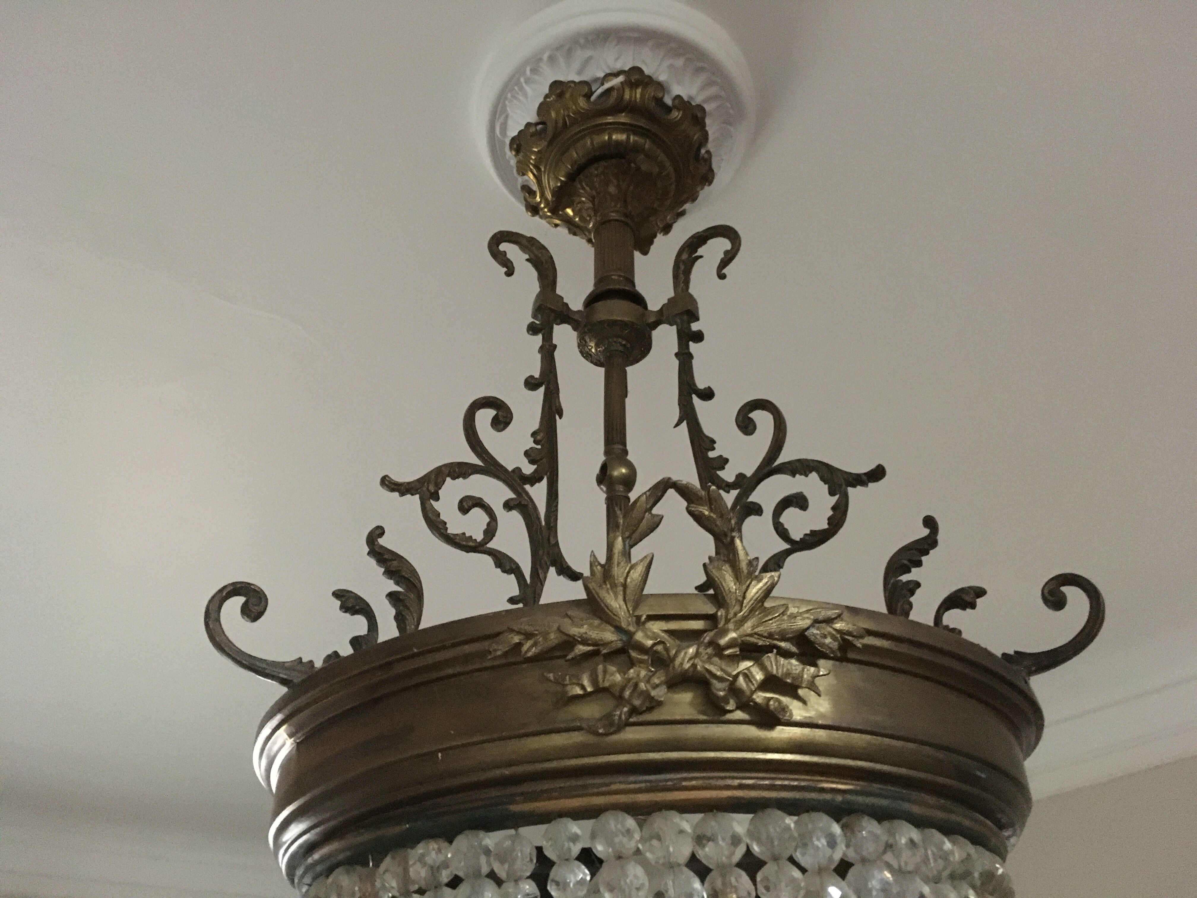 Bronze basket chandelier and tassels