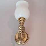 Golden brass wall light from the 1950s.