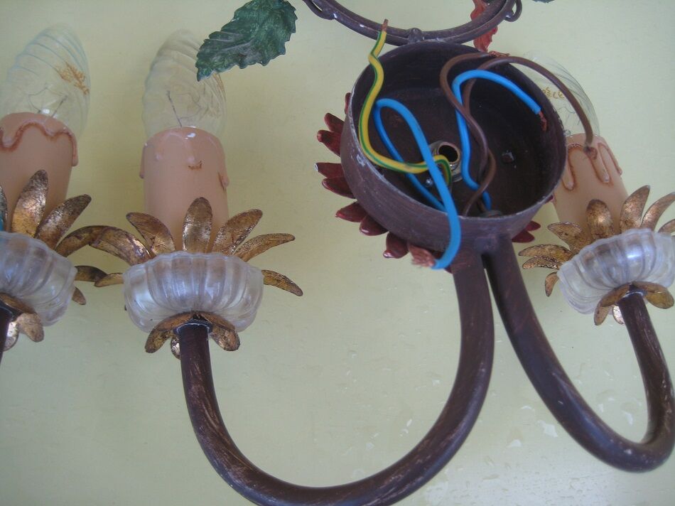 Pair of sconces, patinated metal sheets, glass flowers, 70s