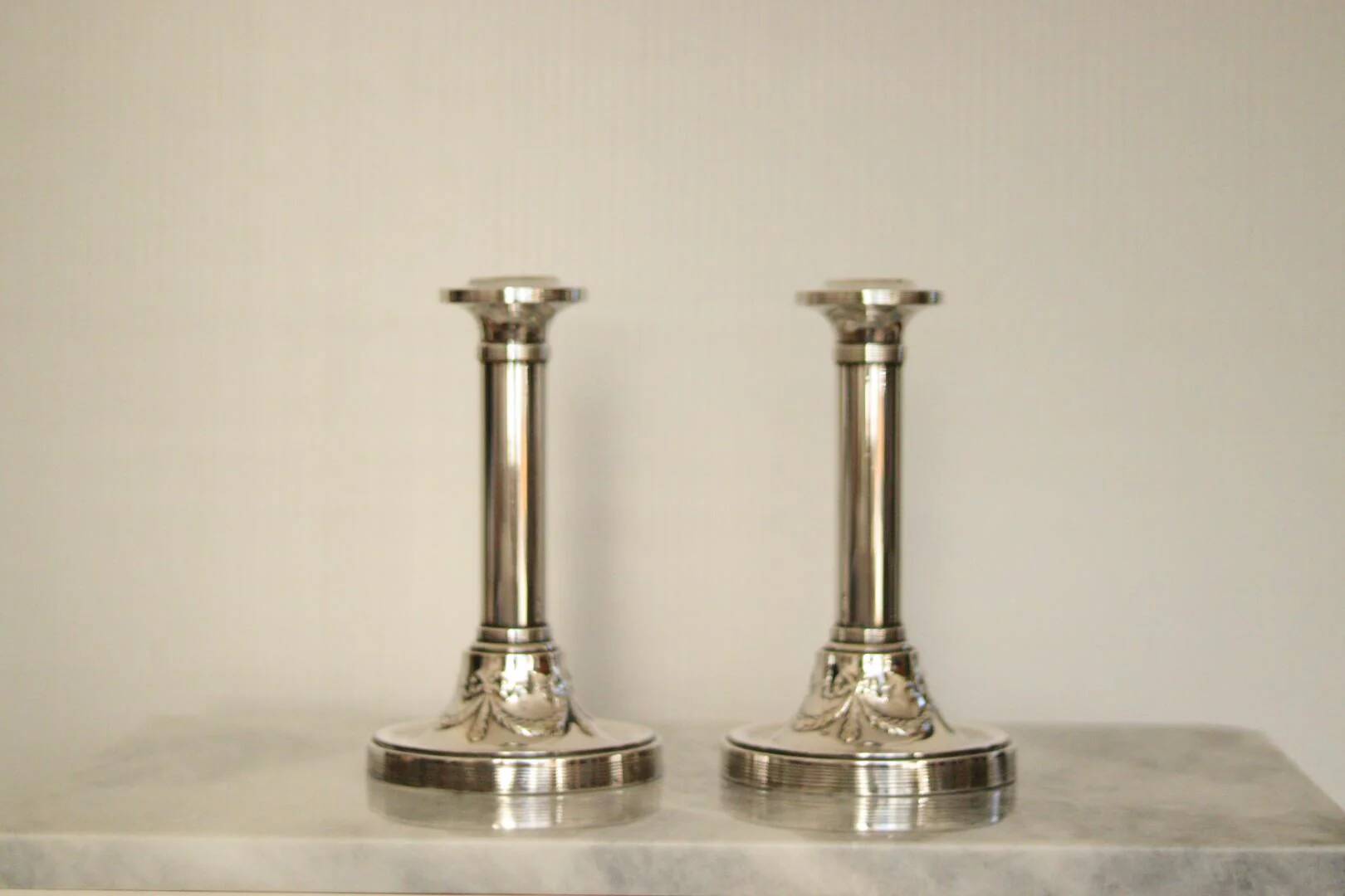 Pair of mid-century silver-plated metal candleholders