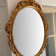 Beautiful Baroque Style Oval Decorative Mirror - Gilded with gold leaf with a Beautiful Patina
