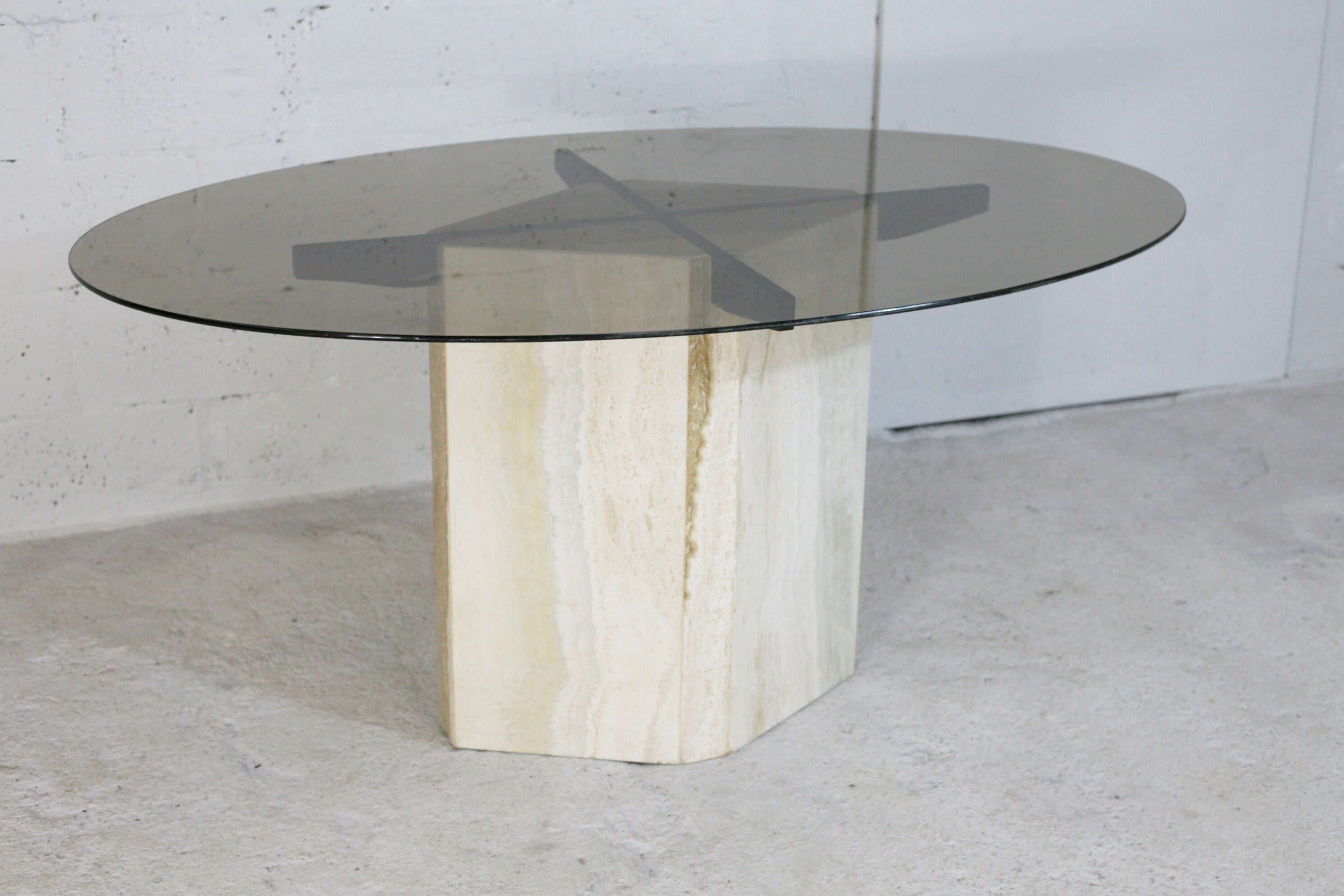 Living table, Comblanchian stone base and elliptical tray in smoked glass, Italy, 1970