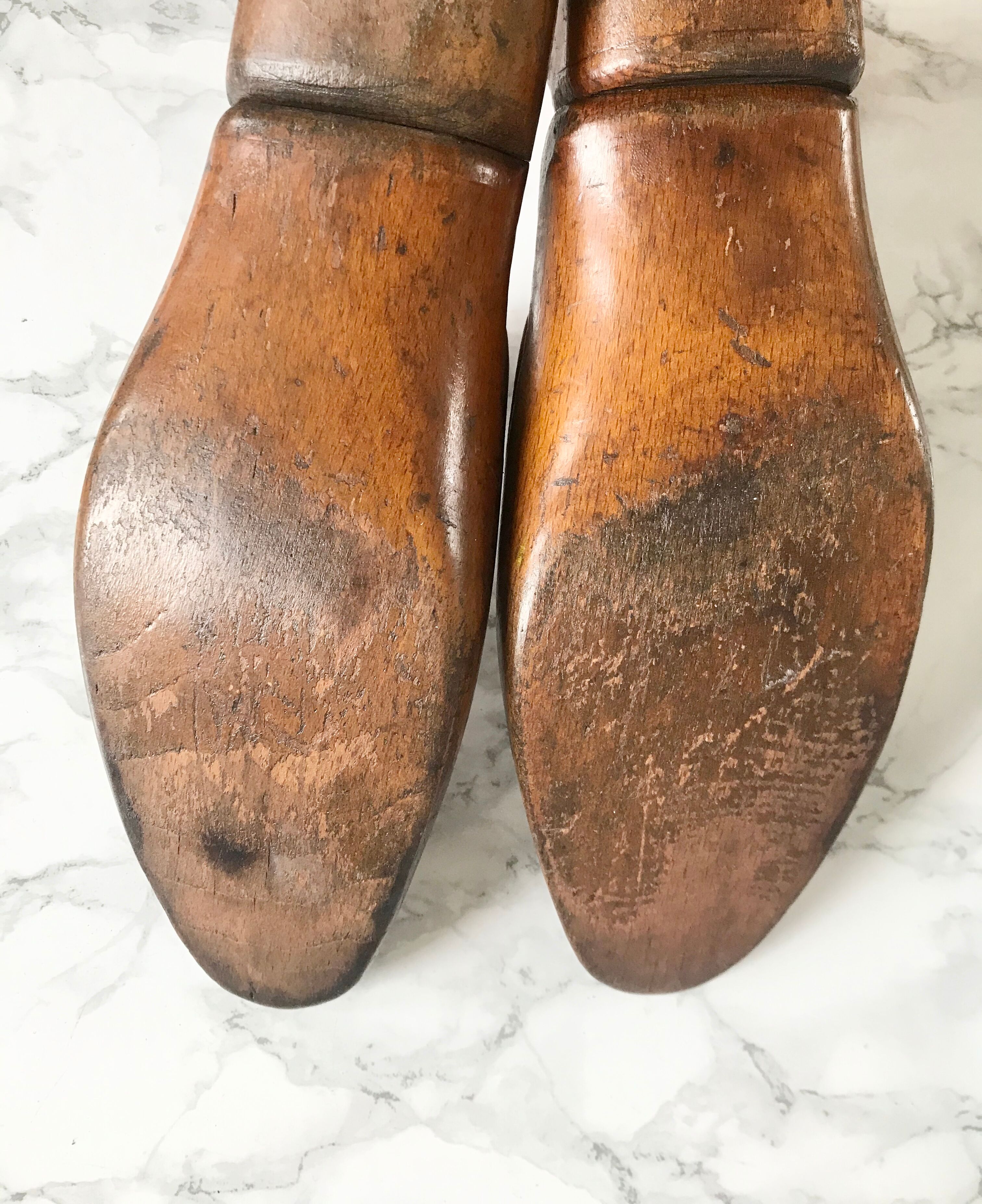 Pair of old solid wood shoes