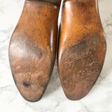 Pair of old solid wood shoes