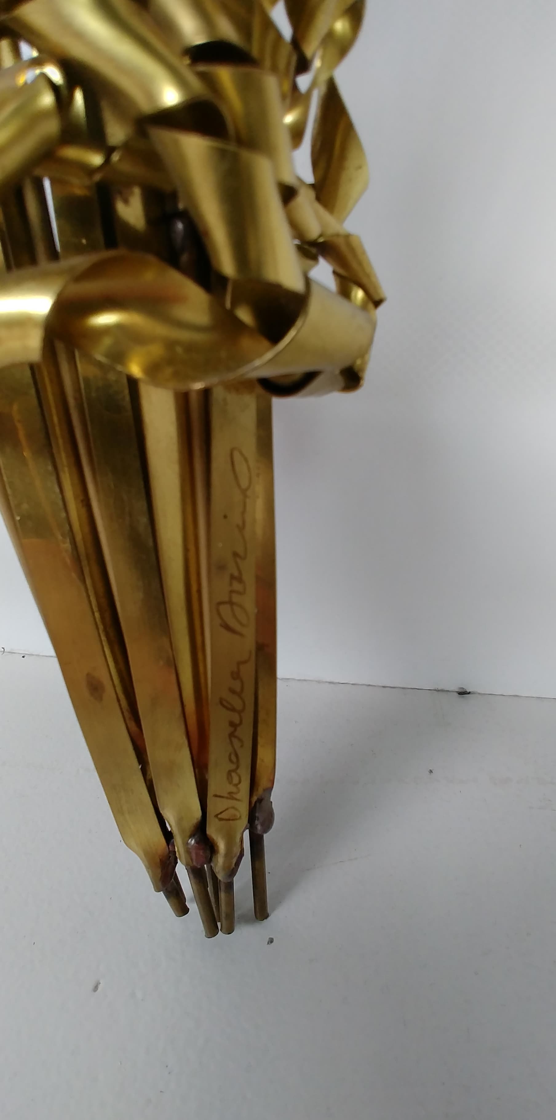 Daniel d'Haeseleer's brass mural sculpture