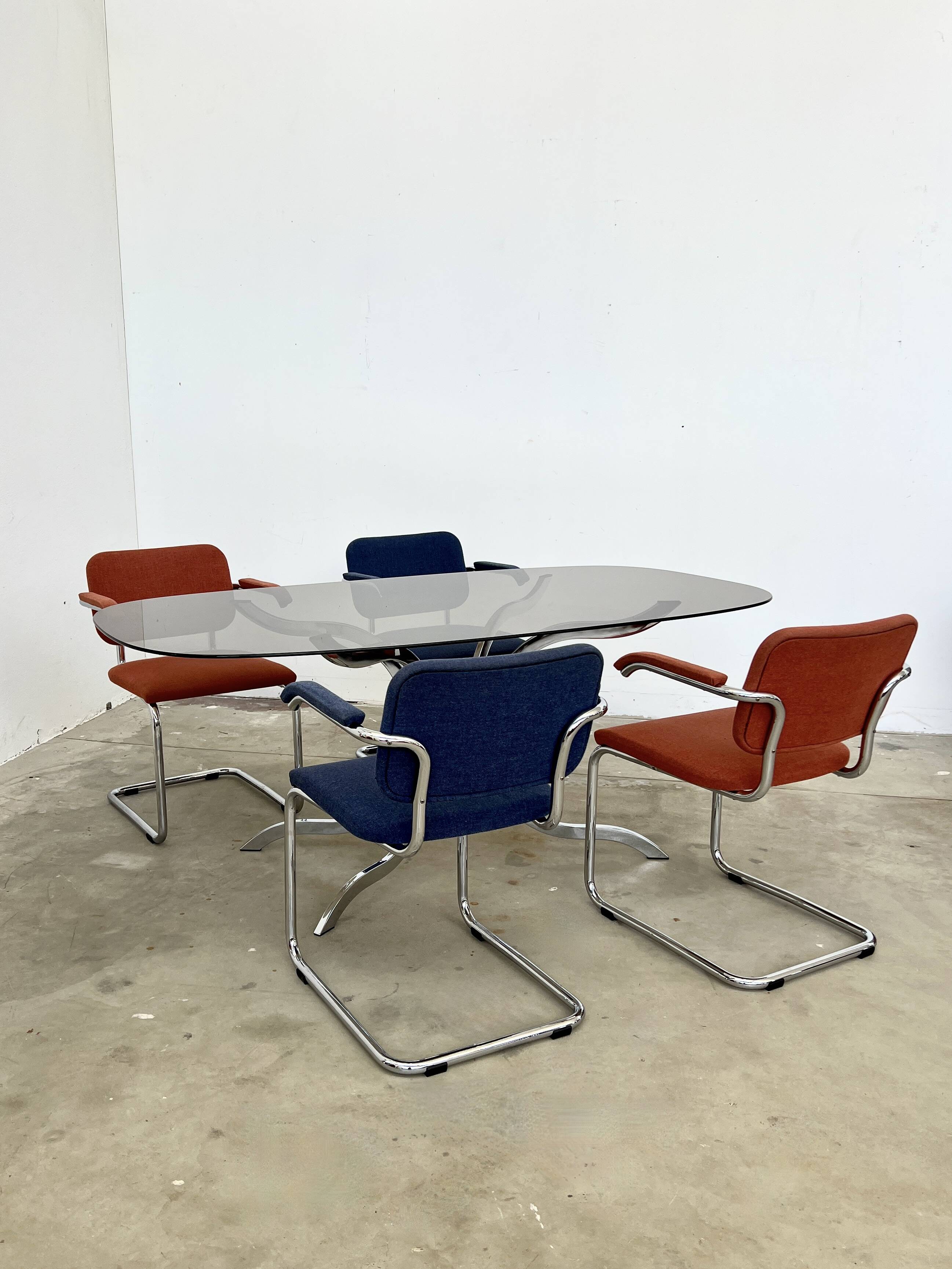 Oval smoked glass and chrome dining table, 1970s