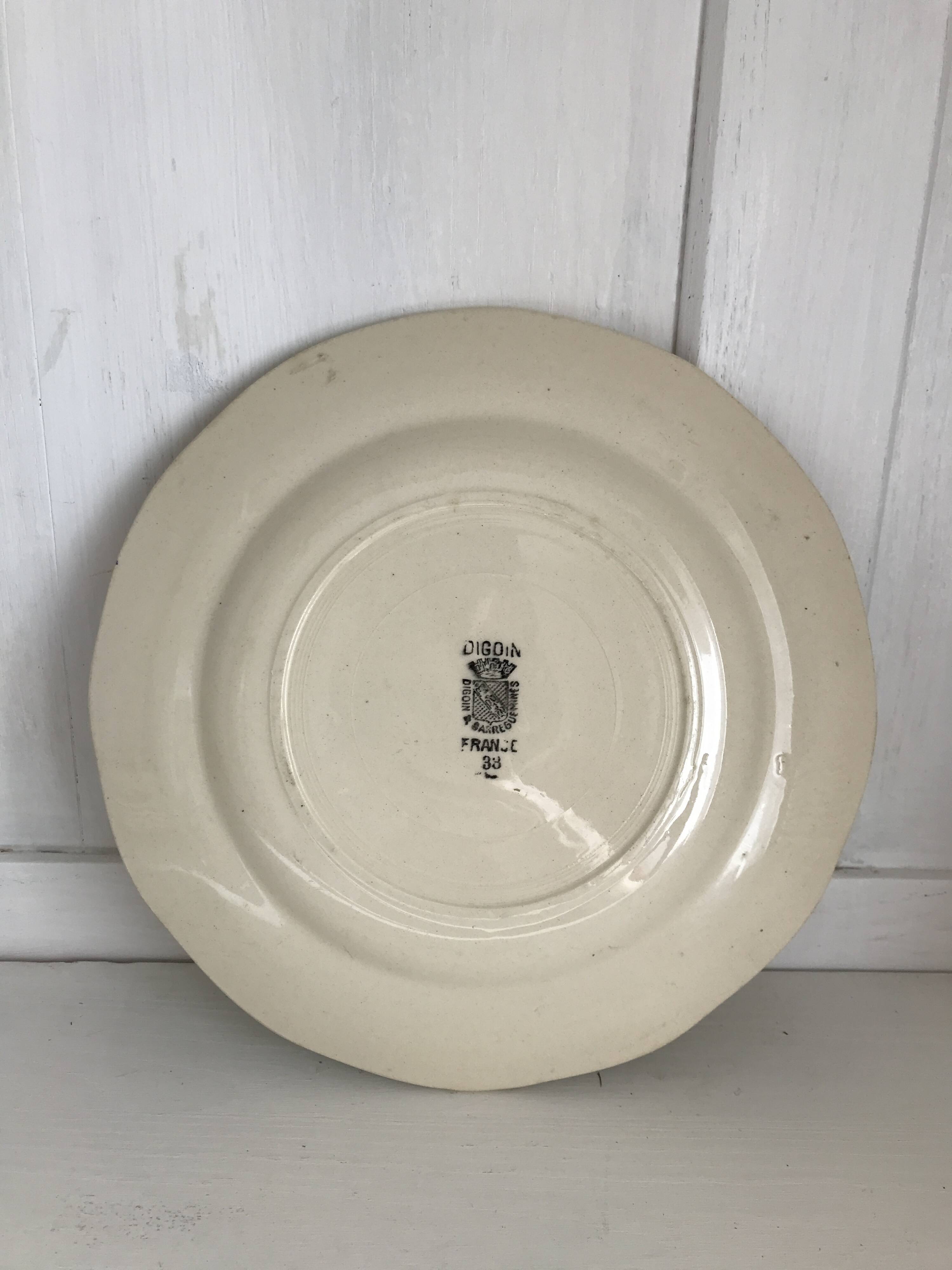 Set of 11 Digoin flat plates, blue rose patterns