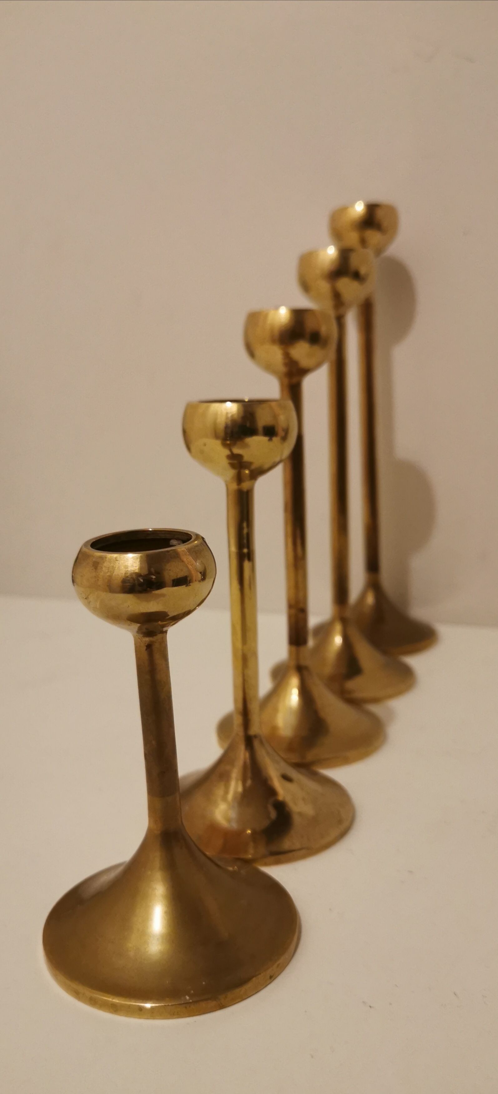 Set of 5 brass candlesticks from the 70s