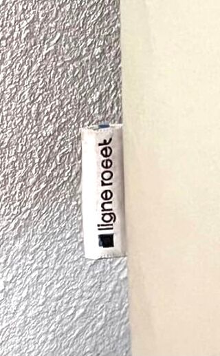 Ligne Roset cream white leather sofa