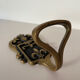 Brass hook fleur-de-lys decoration