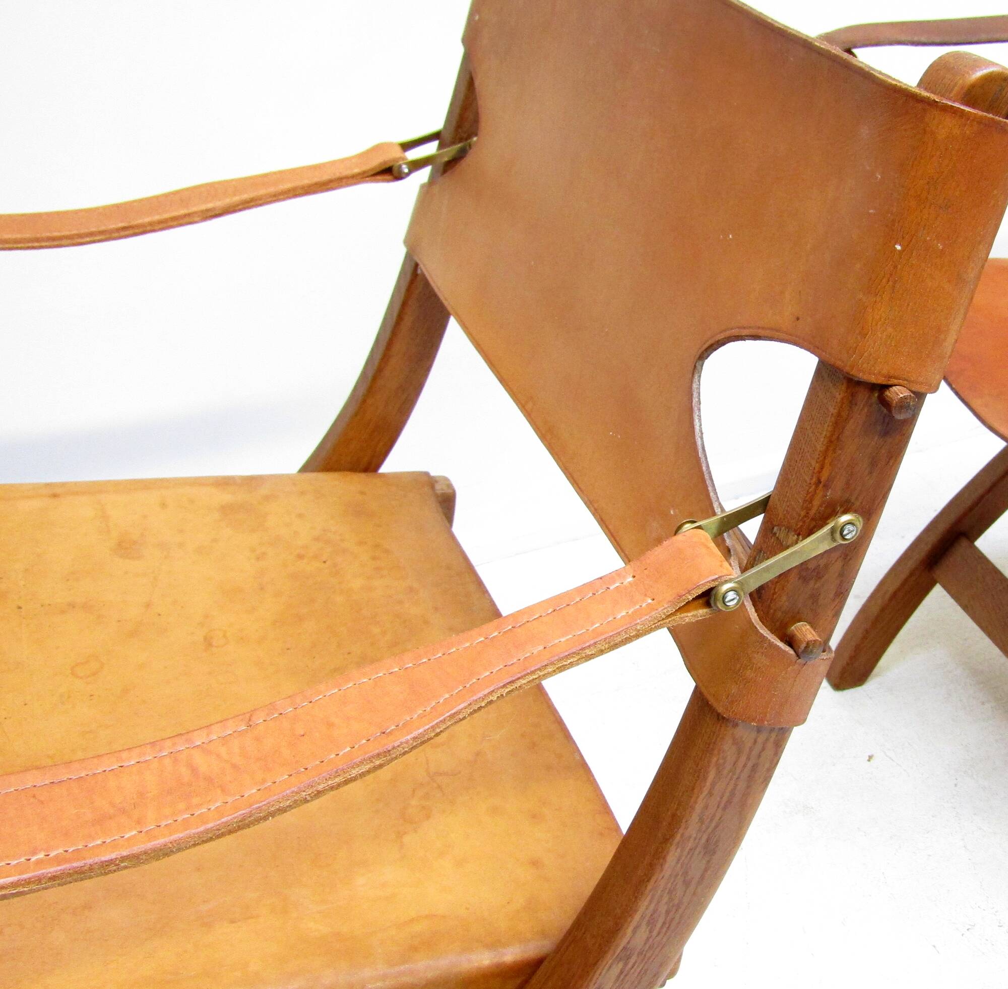 Two 1950s Danish Safari Chairs In Oak & Hide Leather by Poul Hundevad