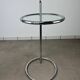 Chrome and glass design side table, adjustable.