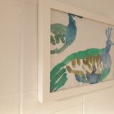 Two peacocks on pa