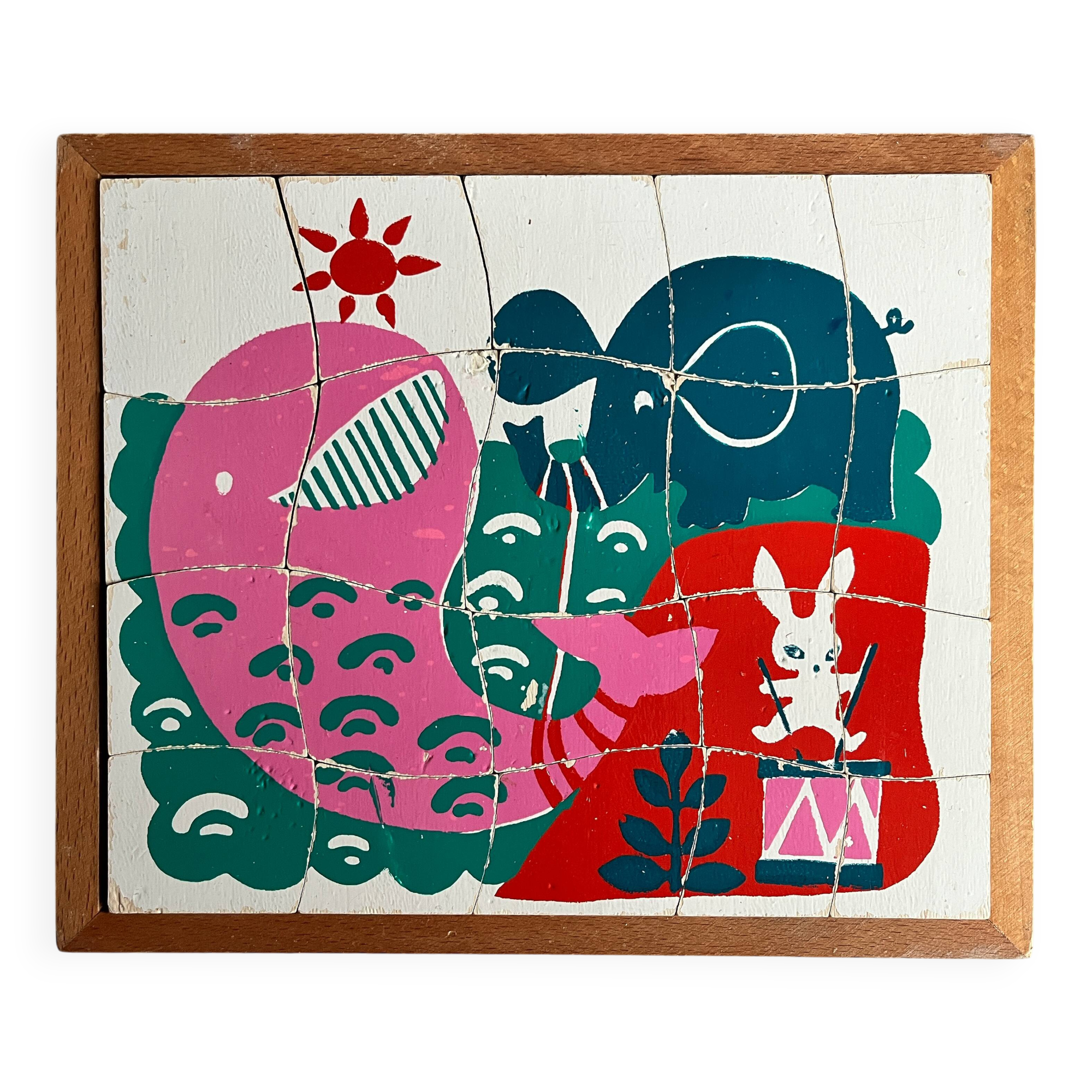Wooden frame puzzle from the 1940s/50s depicting a pink whale.