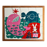 Wooden frame puzzle from the 1940s/50s depicting a pink whale.