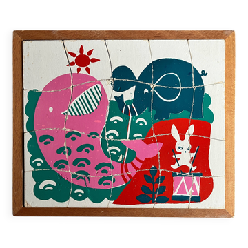 Wooden frame puzzle from the 1940s/50s depicting a pink whale.