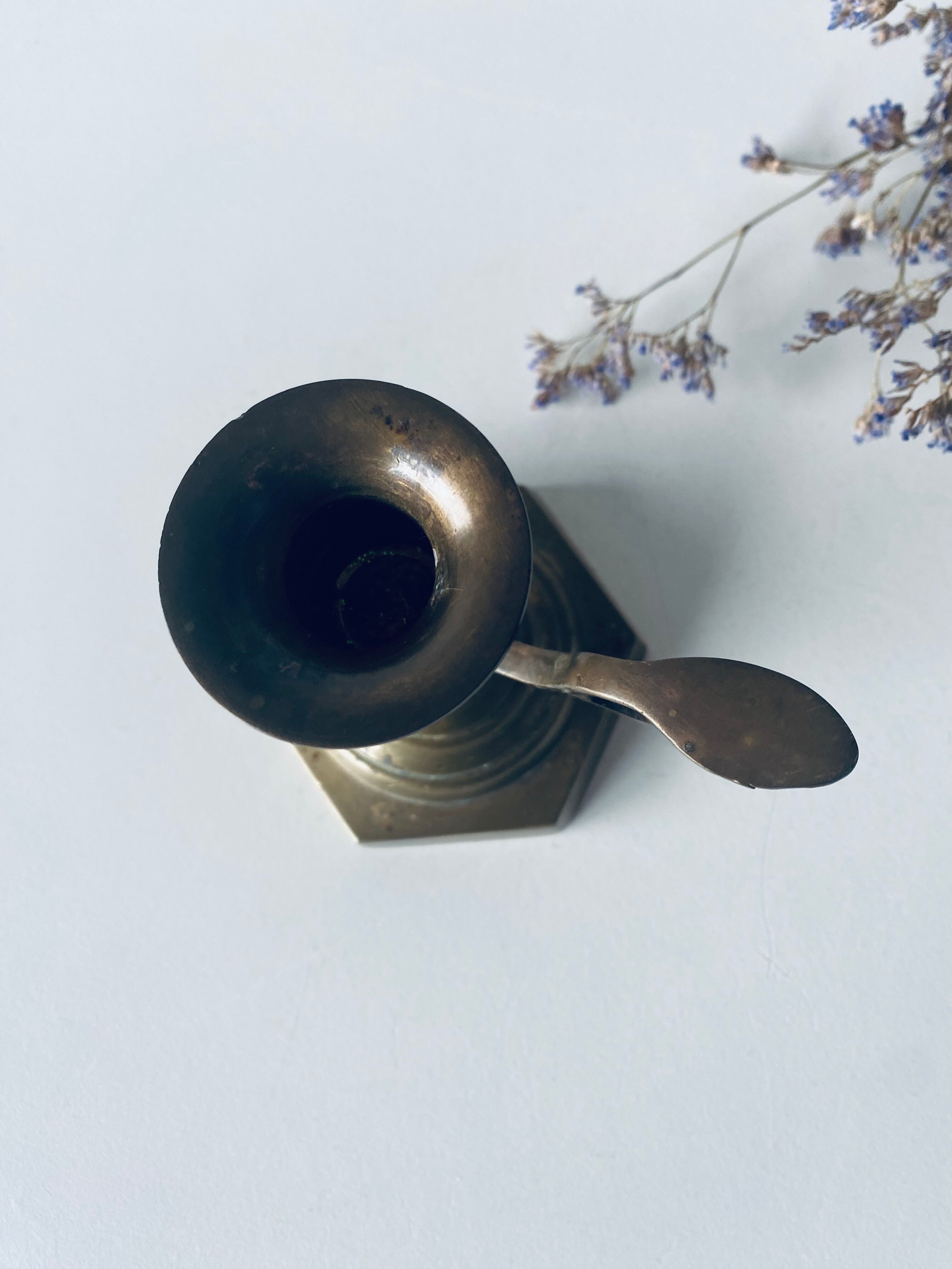 Candle holder with bronze handle