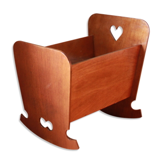 Wooden rocking doll cradle