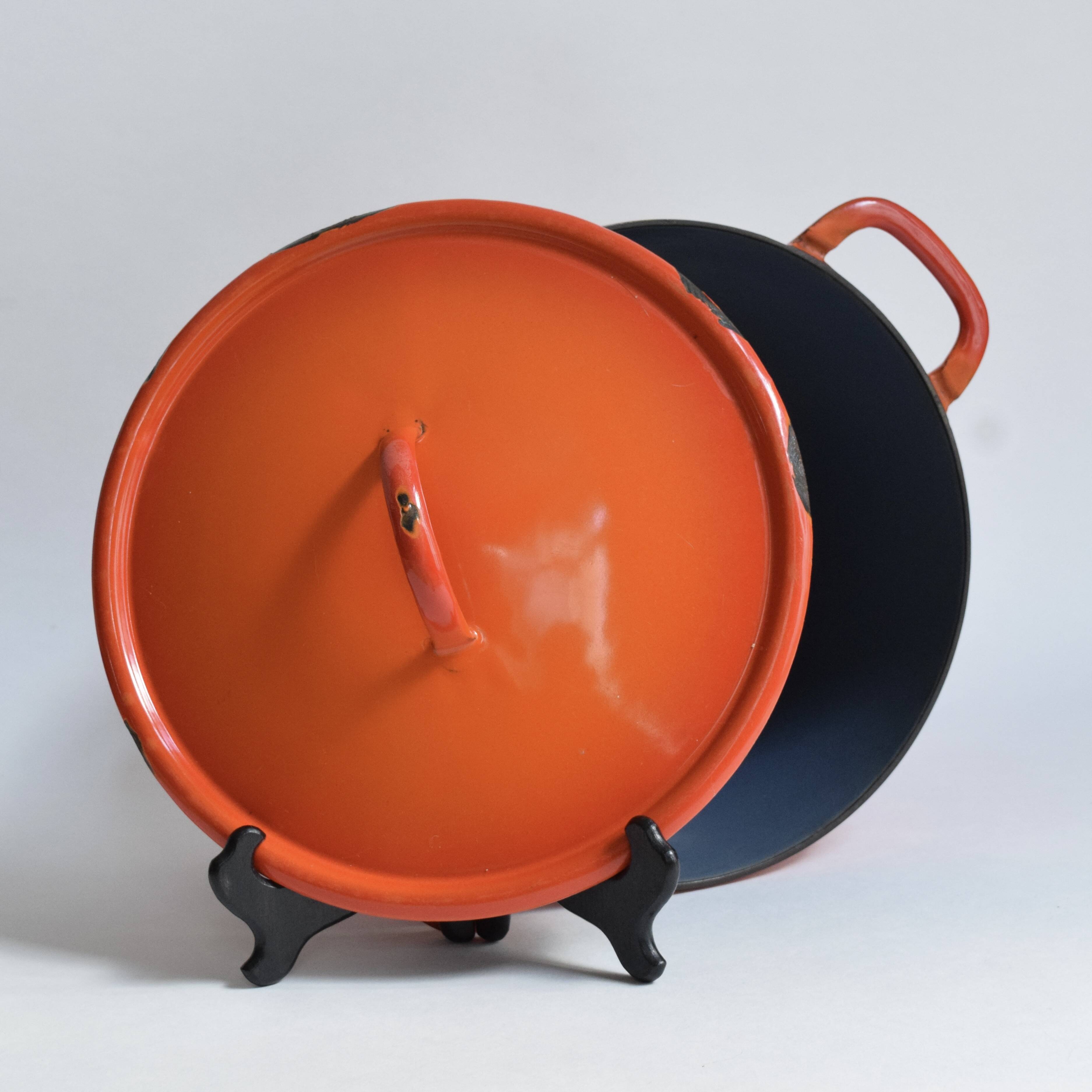Large vintage saucepan or casserole dish in orange enameled cast iron