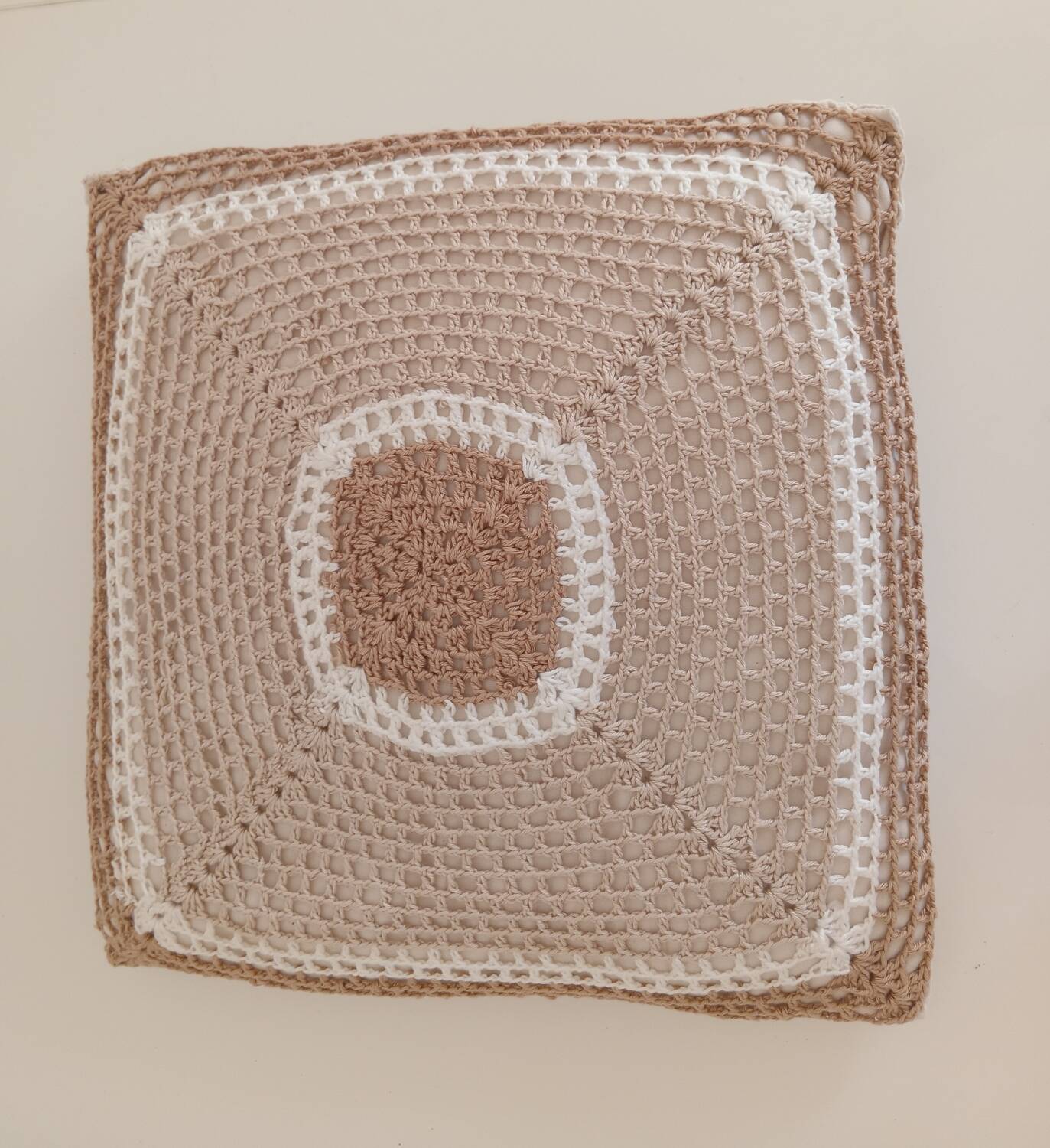 Pair of crocheted cushions