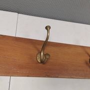 Coat rack in teak and brass. Denmark 1970-80s