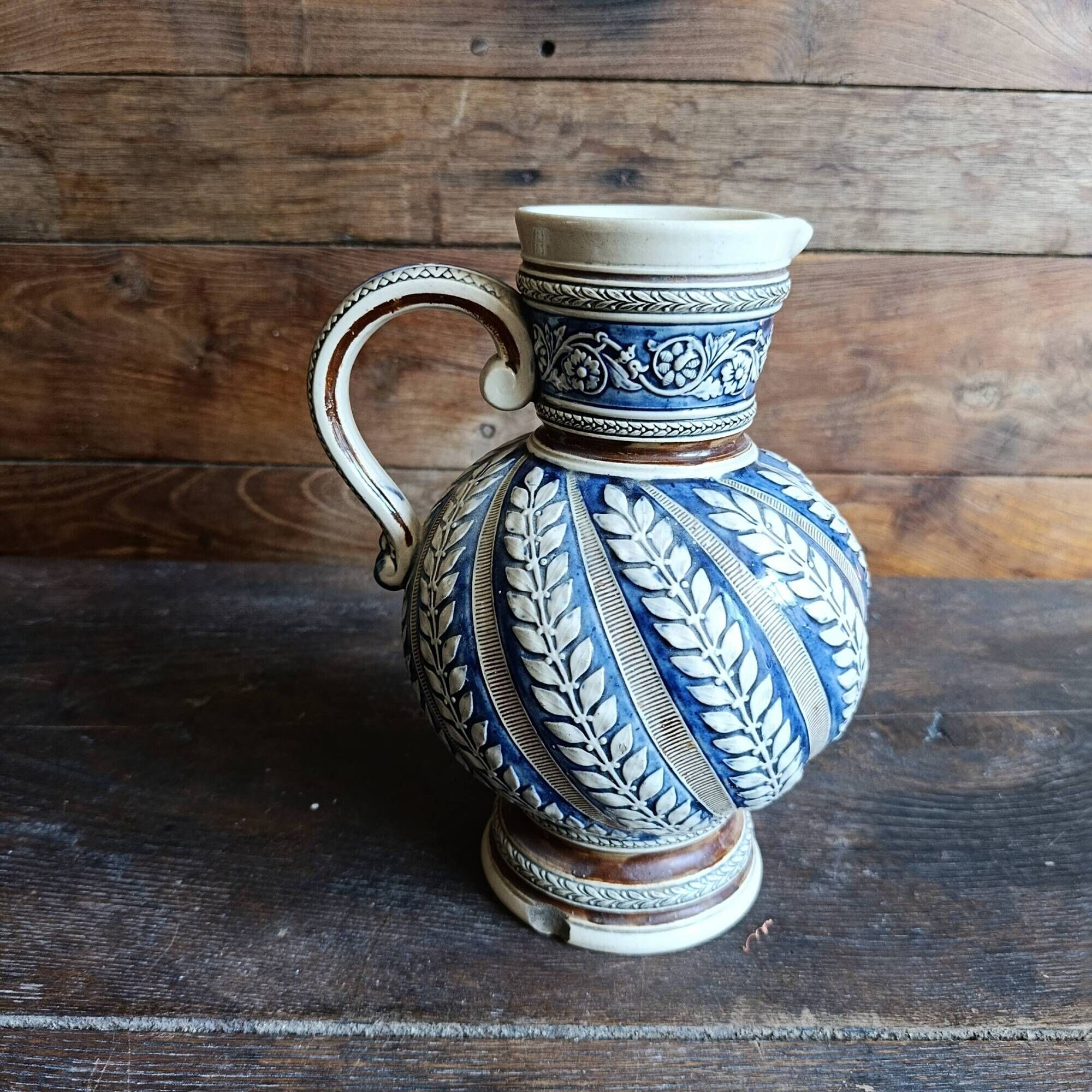 Vintage German Westerwald stoneware jug with cobalt blue floral relief