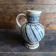 Vintage German Westerwald stoneware jug with cobalt blue floral relief