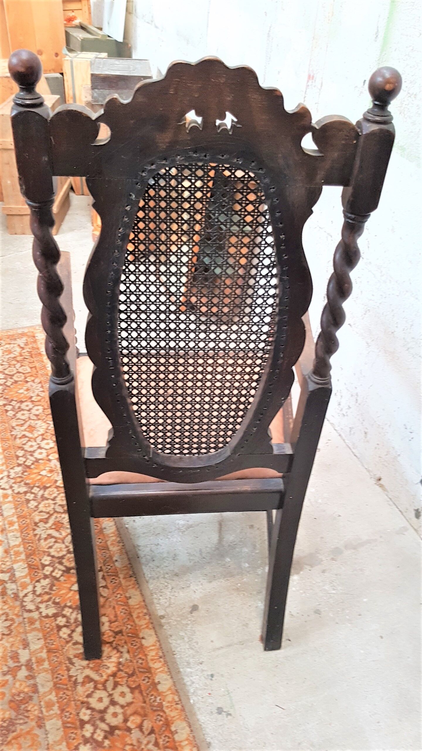 Solid oak and leather armchair