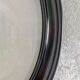 Oval frame in black varnished wood