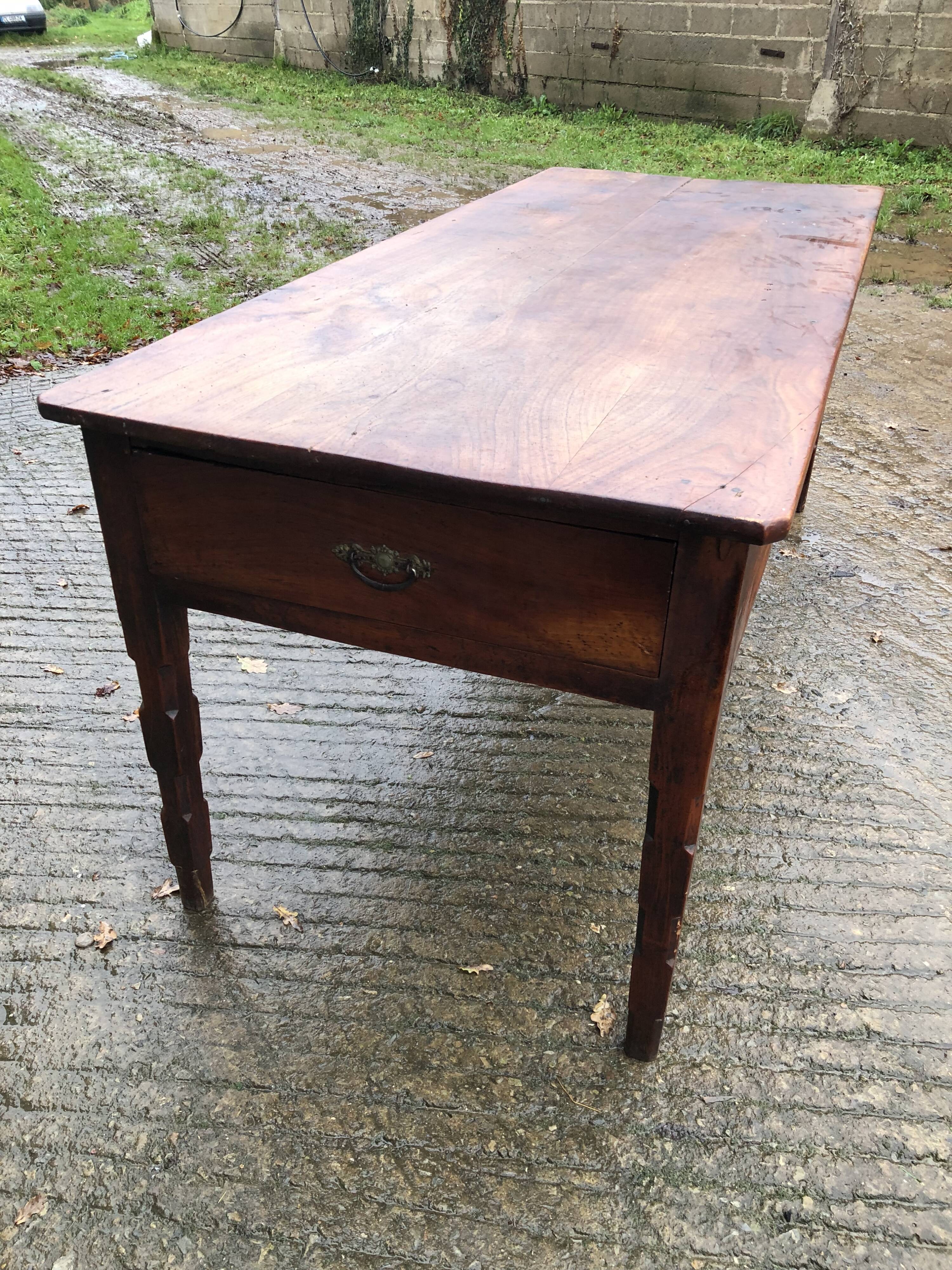 Antique farmhouse table in solid cherry wood with 3 drawers.