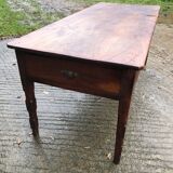 Antique farmhouse table in solid cherry wood with 3 drawers.