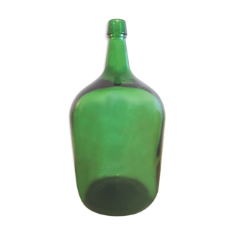 Demijohn in vintage green glass