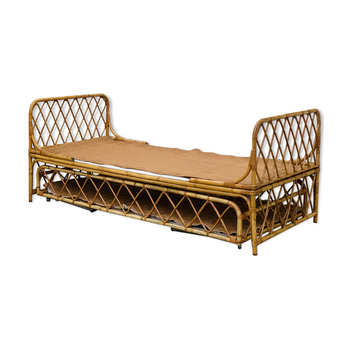 Rattan leg bed 1960