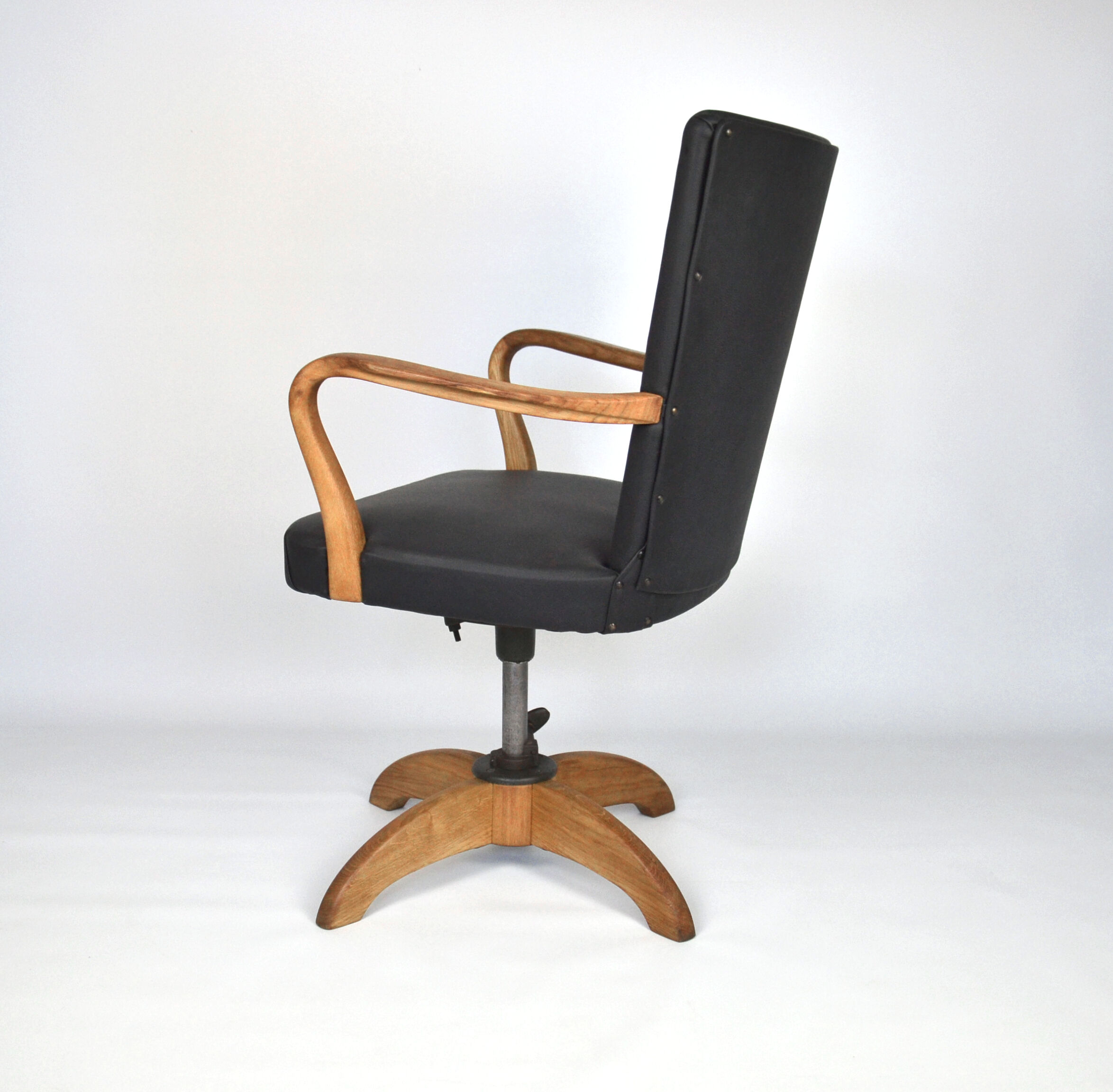 Antique black leather and oak desk chair 1900s, Sweden