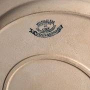 Round serving dish model Birds Mouches of the earthenware factory of Gien.
