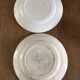 2 old flat plates decorated with dark blue roses in earthenware. Two different settings