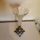 Art Deco vase in the shape of a chalice made of silver-plated metal and cut glass.