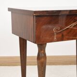 Vintage bedside table from the 70s in varnished wood.