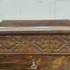 Antique chest of drawers on wheels with wood carving (key top drawer)