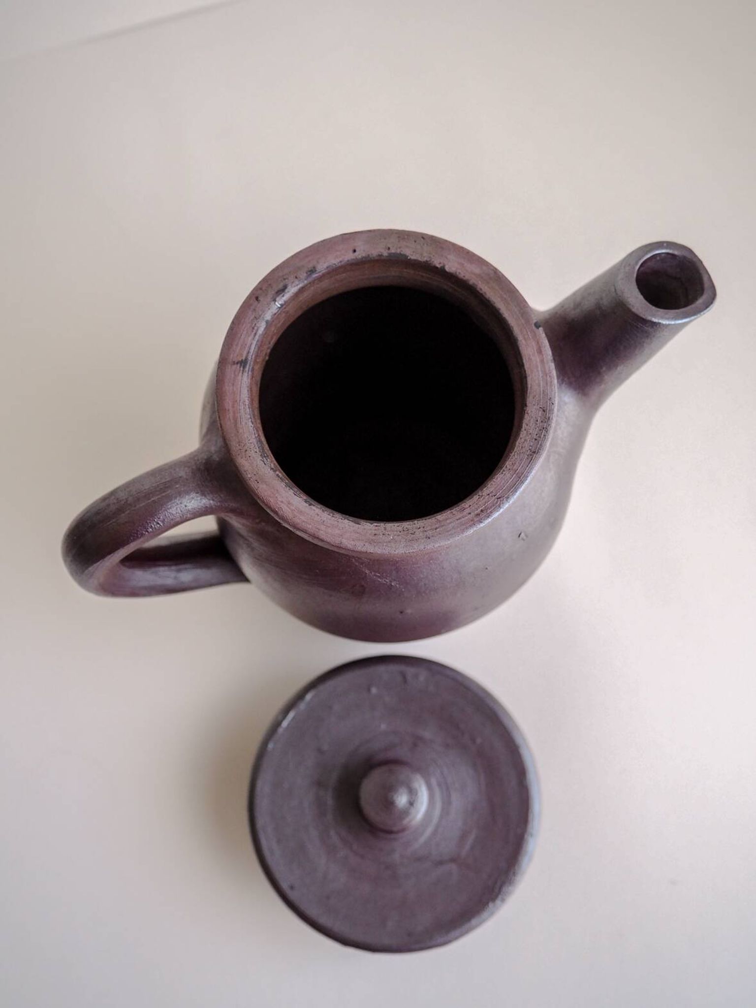Brown ceramic artisan coffee maker