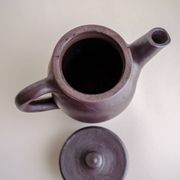 Brown ceramic artisan coffee maker