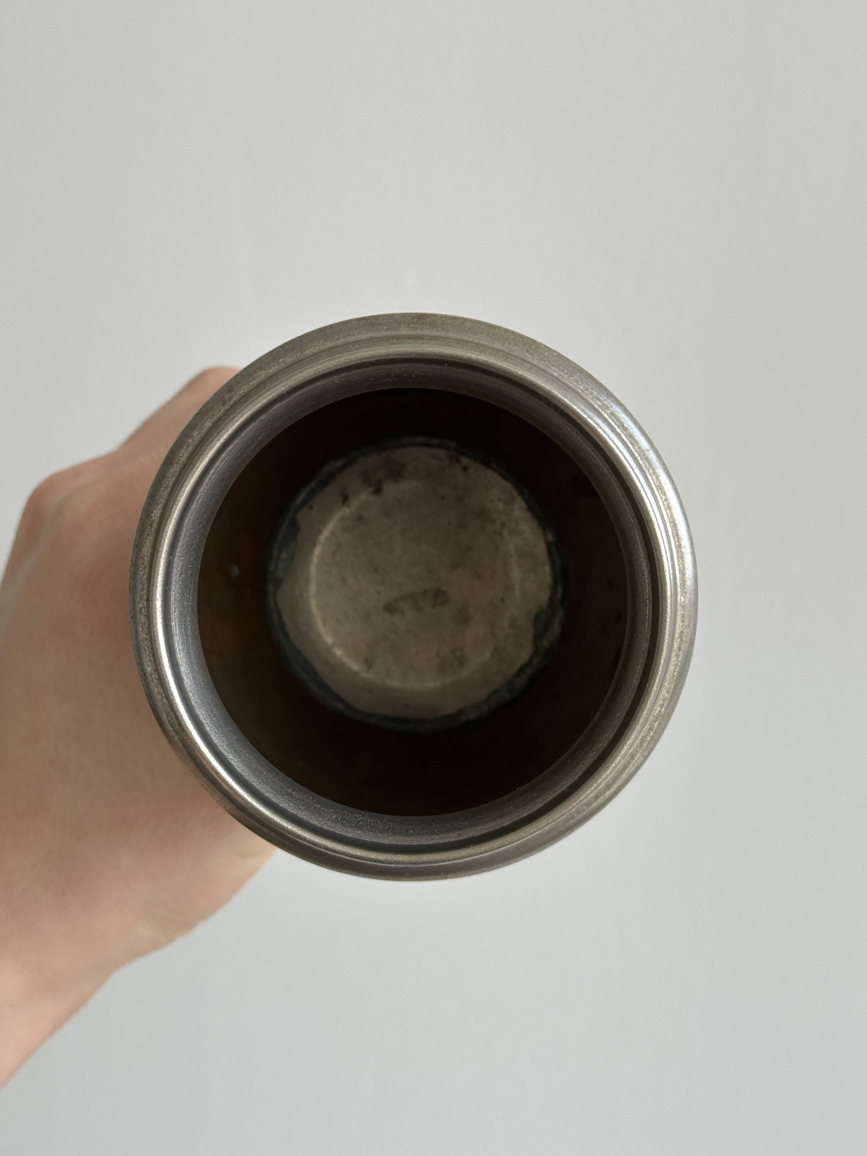 Vintage patinated tin vase