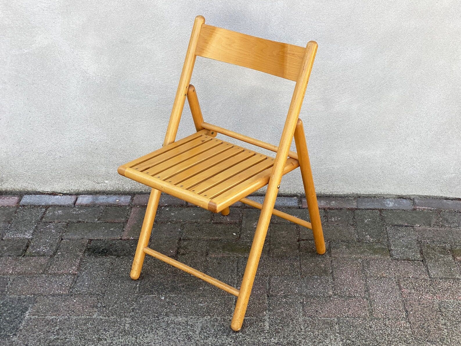 Mid Century wooden folding chair with a slat seat