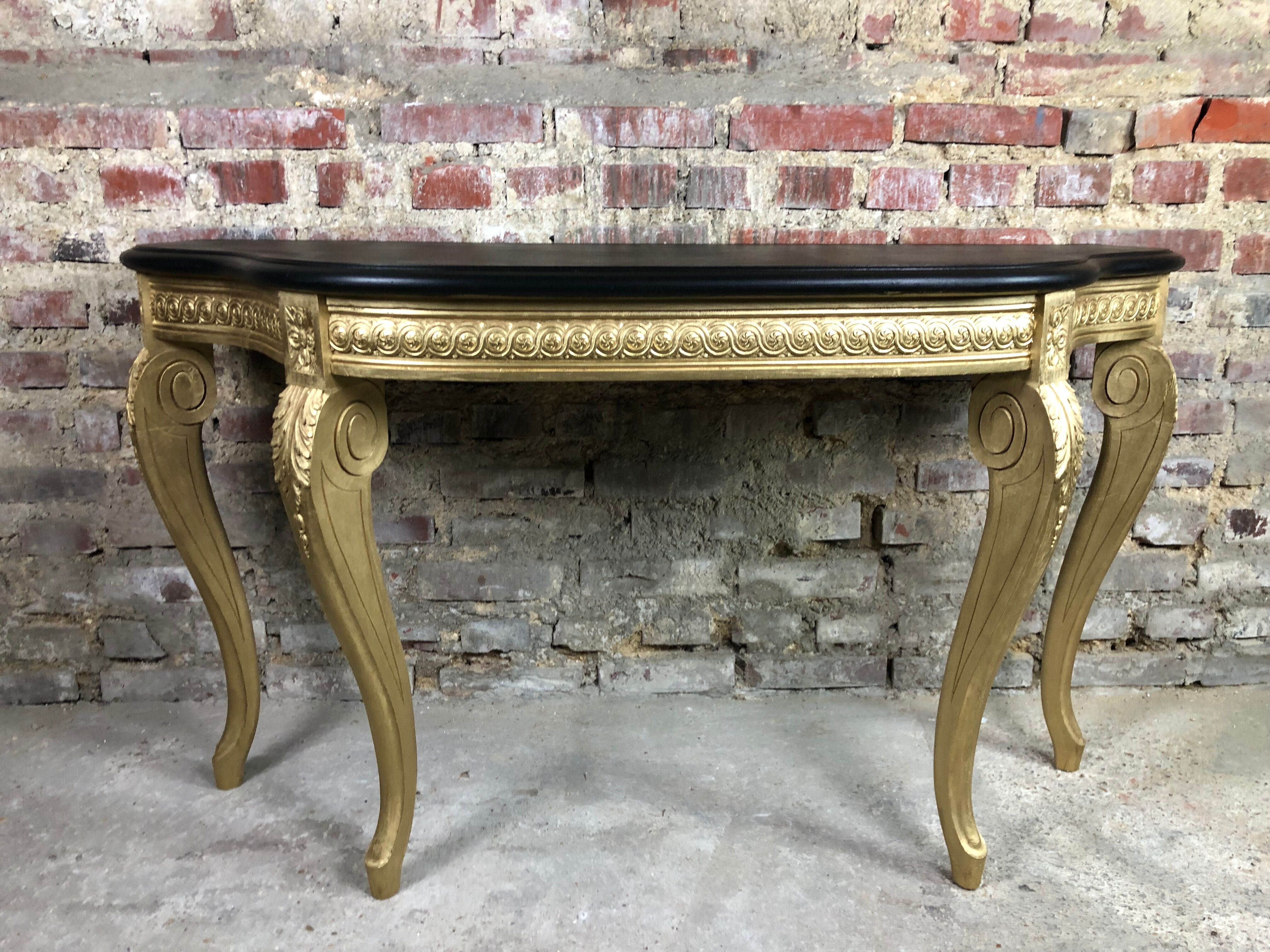 Louis XV style console in carved wood with waxed black wood top