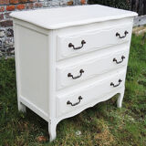 Old chest of drawers in white wood