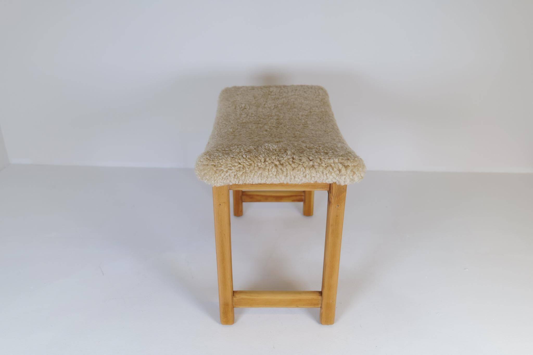 Modern Scandinavian stool in pine and sheepskin, Sweden, 1970s