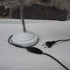 White articulated lamp with metal arm