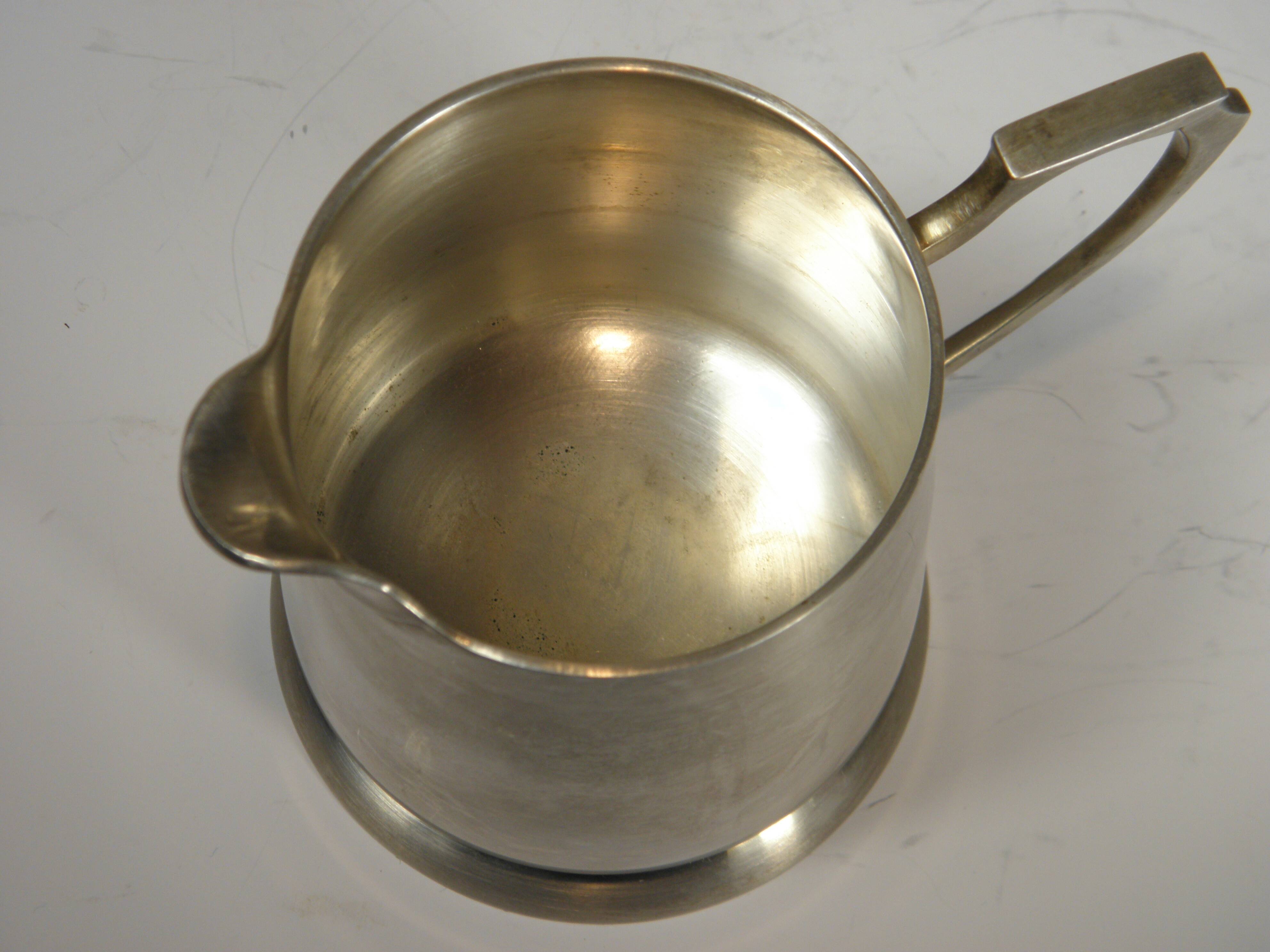 Silver-plated metal coffee pot and milk jug